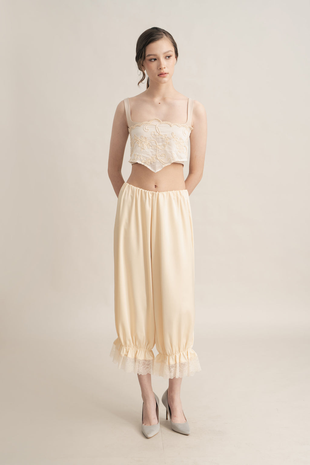 Quiet Peplum Lace Pants in Butter Yellow