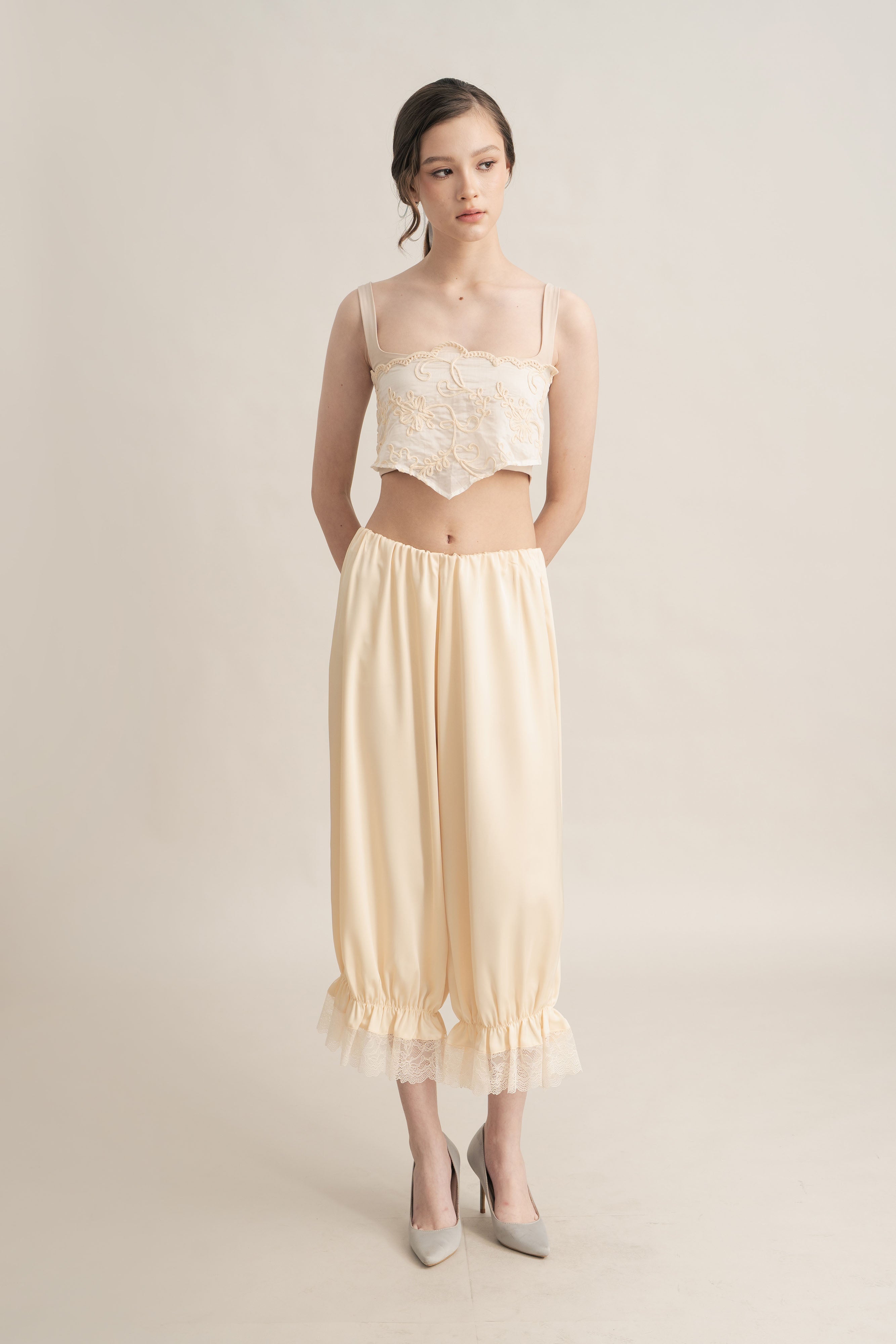 Quiet Peplum Lace Pants in Butter Yellow