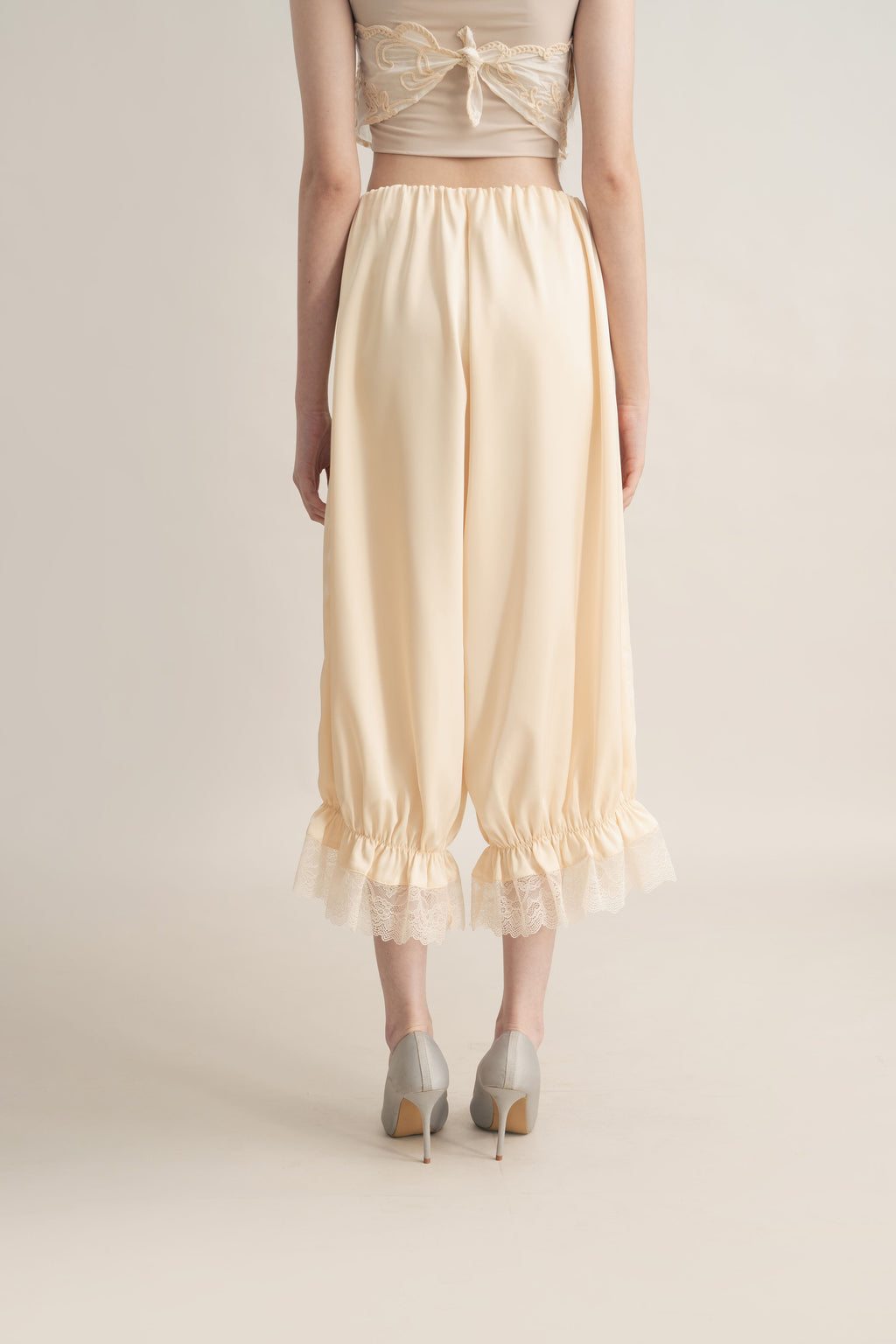 Quiet Peplum Lace Pants in Butter Yellow