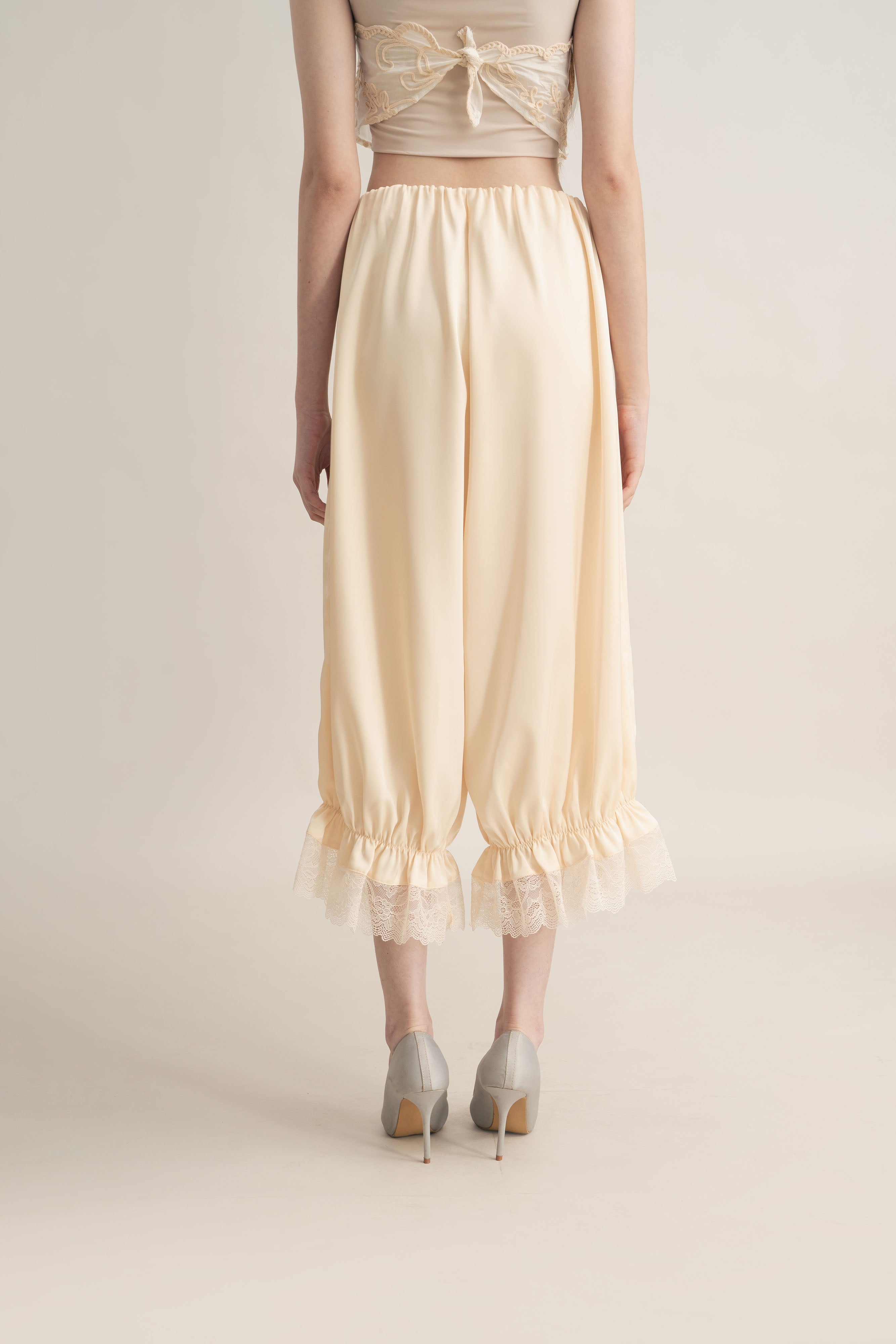 Quiet Peplum Lace Pants in Butter Yellow