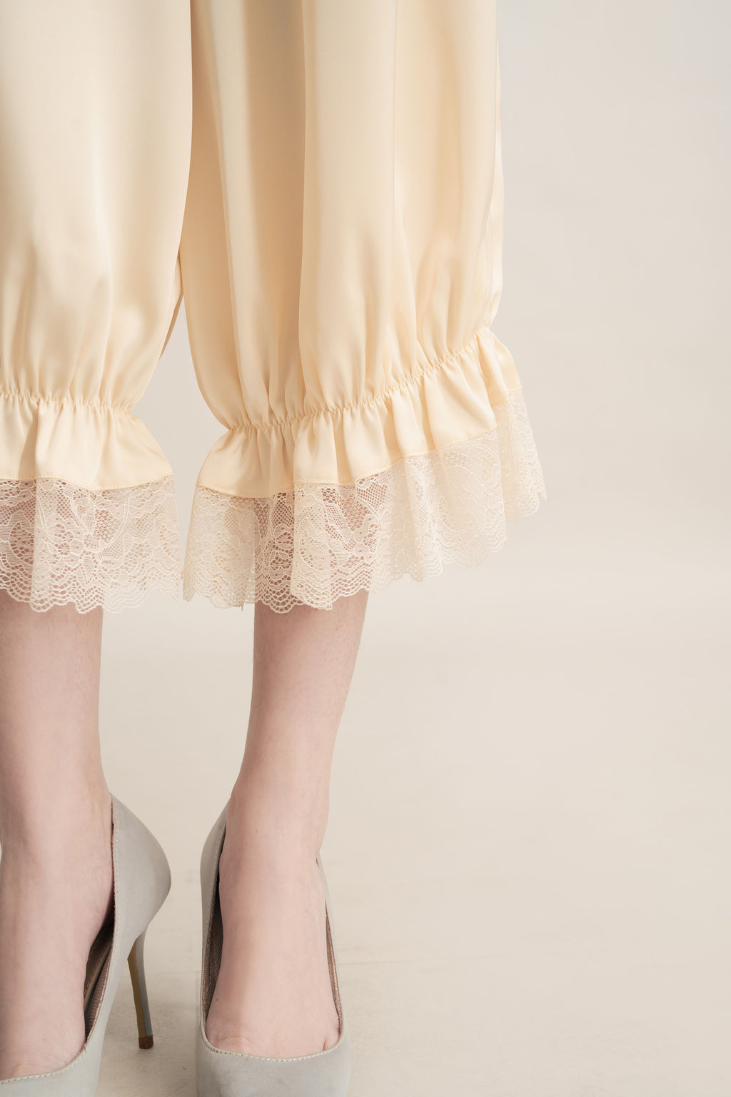 Quiet Peplum Lace Pants in Butter Yellow