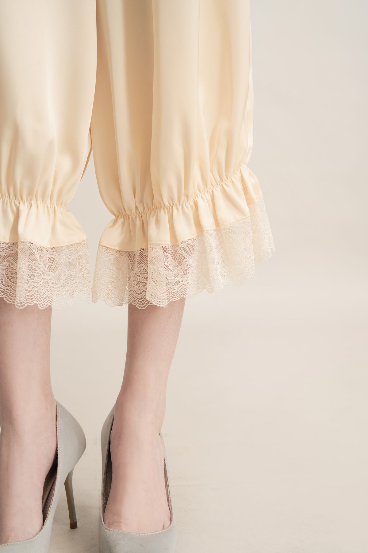 Quiet Peplum Lace Pants in Butter Yellow