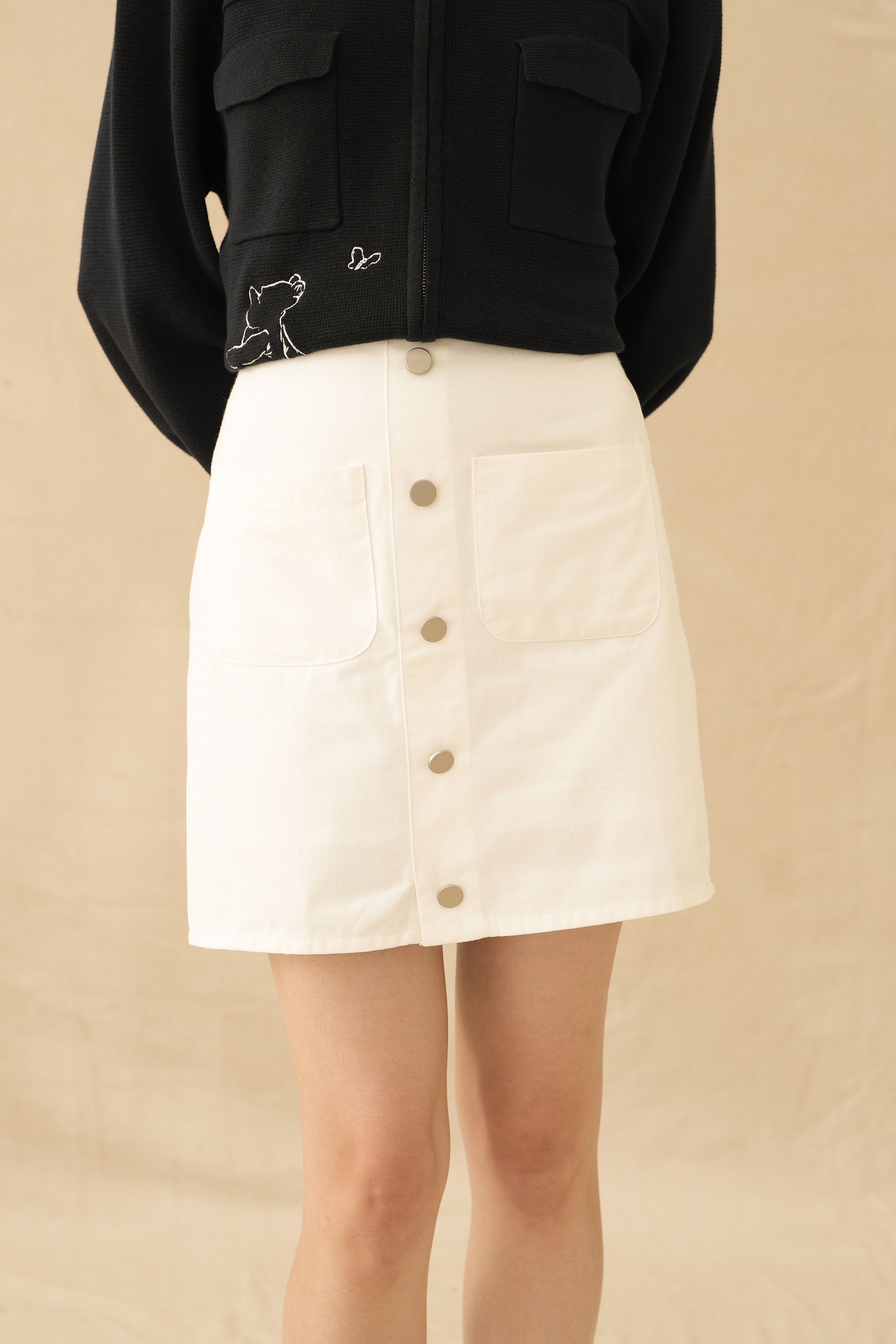 NVR Button Mini Skort in Buttermilk